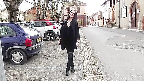 Slutty brunette shows off her ass while walking out on her couch