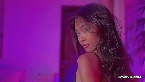 Asian babe with a perfect face is getting her pussy wet