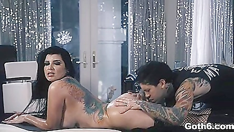 Girl with tattooed body is wearing lingerie and deepthroat