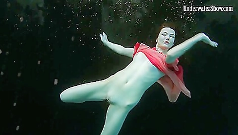 Cute brunette with a sexy bikini on swimming in the open