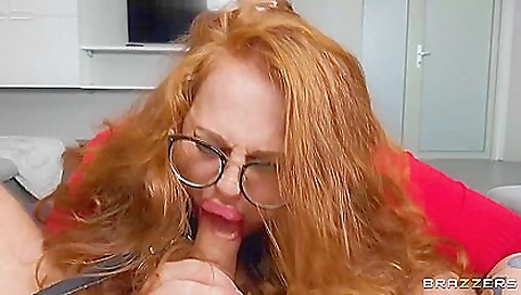 Busty redhead with a hairy pussy is getting fucked