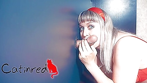 Big boobed milf gives a blowjob with the help of her guy