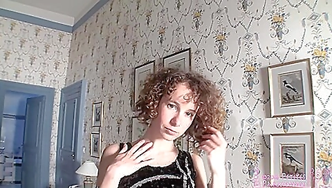 Sexy brunette naked with stockings getting dressed