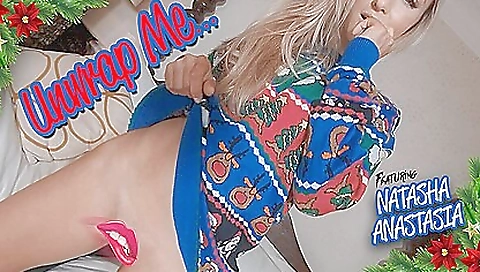 Beautiful blonde is stripping naked in front of the camera