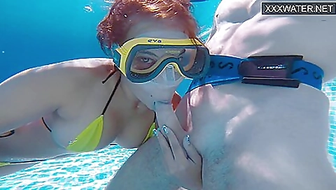 Sexy redhead in lingerie gets her black cock pounded in the shower