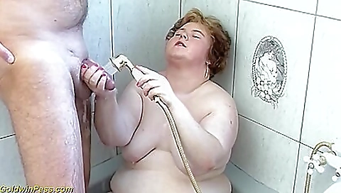 Brunette milf 18+ in the shower gives a big blowjob