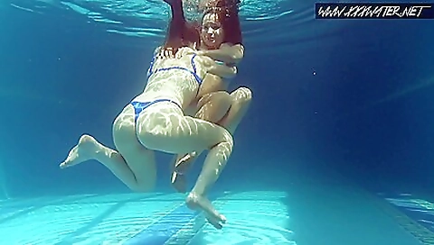 Redheaded chick enjoys being fucked by her lesbian lover