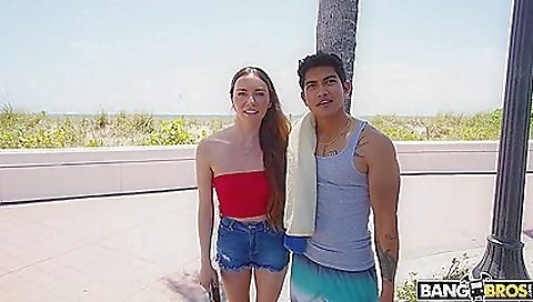 Tattooed redhead fucked in the car with a muscular dude