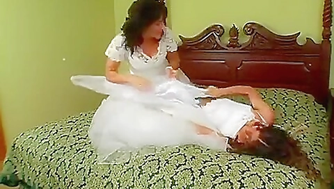 Hot brunette is on the bed and she does sexy masturbation