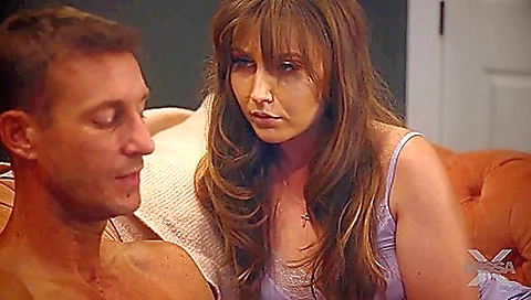 Big-titted brunette pussy in red hair enjoys a good time