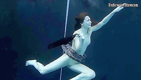 Adriana and Katka swim in the pool in the hot shower