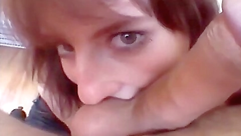 Beautiful redhead babe takes cock in her mouth in POV