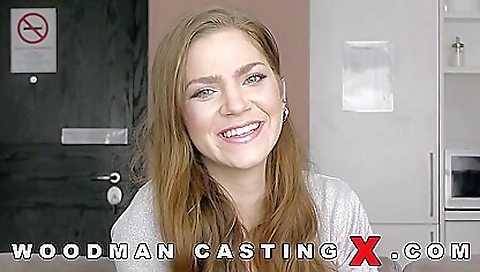 Sexy brunette teen shows her sexy body in front of a camera